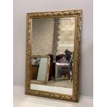 A large Victorian style rectangular gilt composition wall mirror, width 114cm, height 176cm