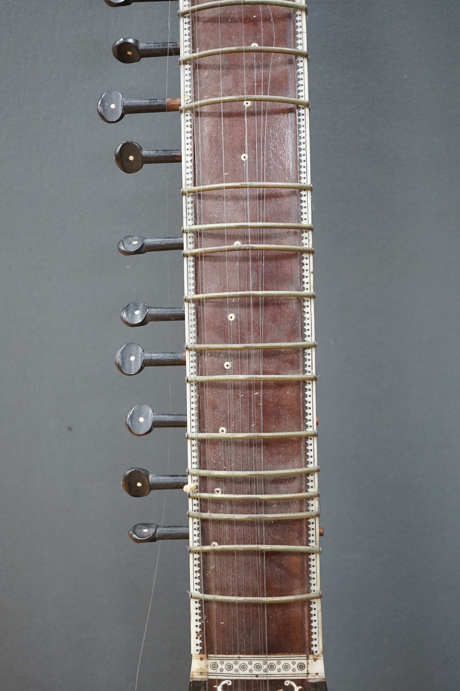 An Indian sitar, with ivory bridge and decoration, inlaid with ‘Harbhajan Grewal’ overall length - Image 3 of 7
