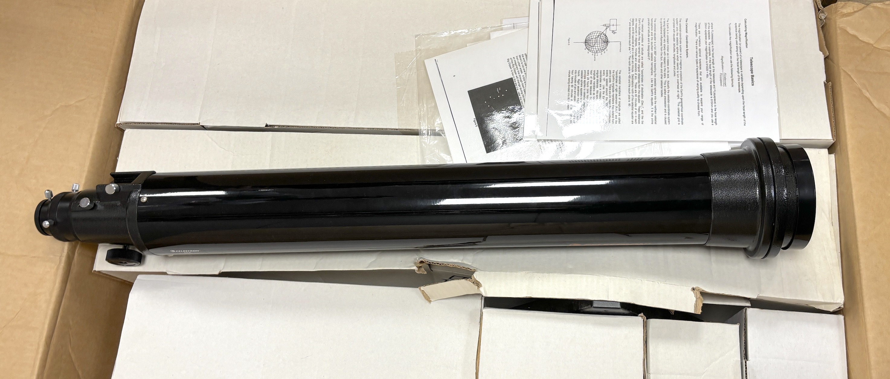 A Celestron C4-R refractor telescope, FL=1000mm F/10, in original box and packing compartments