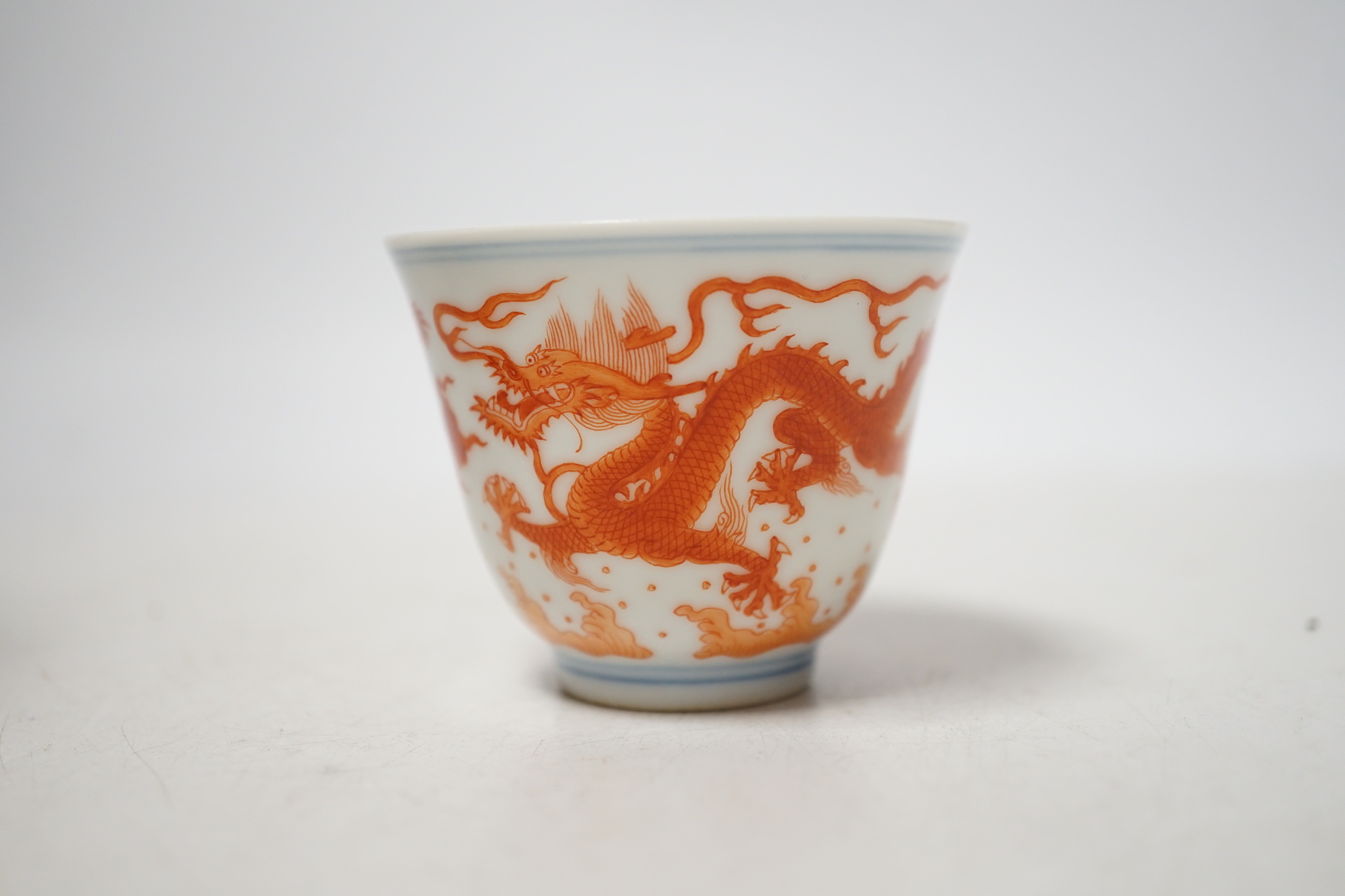 A Chinese iron red enamelled ‘dragon’ tea bowl, 5cm high - Image 3 of 4