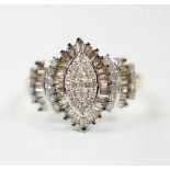 A modern 9ct gold and diamond navette shaped cluster dress ring, set with baguette and round cut