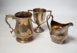 A George III silver cream jug, London, 1806, a George III silver half pint baluster mug, London,