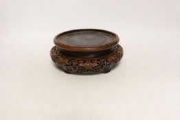 A Chinese hongmu stand, early 20th century, 19cm in diameter