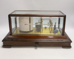 An early 20th century Negretti & Zambra barograph, engraved ‘made in England’, in a mahogany case,