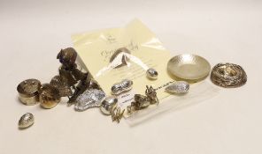 A group of modern novelty silver and white metal items including a limited edition surprise acorn by
