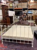A Victorian style brass mounted painted metal double bed frame, width 150cm, length 208cm, height