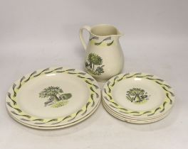 Eric Ravilious for Wedgwood, six garden pattern plates and a jug, largest 24cm in diameter