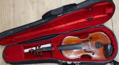 An unusual late 17th century and later cased Quinton (five string violin/viola), with early body