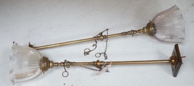 A pair of Victorian brass gas lights, converted to electric