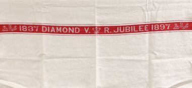 An unusual Victorian jubilee damask hand towel, 1897, and a lace stole, lace trimming and a pair