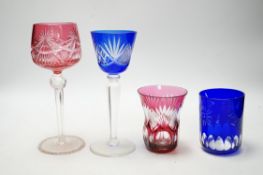 A group of eleven colour flashed hock glasses, a jug, vase and nine tumblers