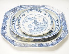 Three 18th century Chinese blue and white export dishes, largest 46x39cm