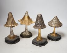 Four Elizabeth II limited edition surprise toadstools by Christopher Nigel Lawrence, opening to