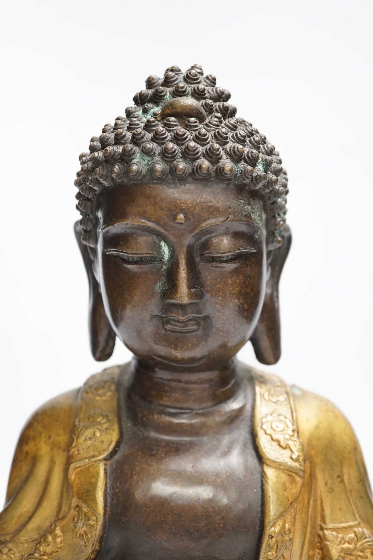 A gilt bronze seated Buddha, 35cm high - Image 2 of 4