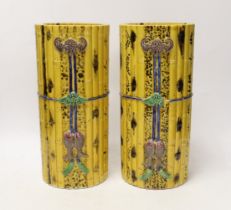 A pair of Chinese polychrome glazed faux bamboo vases, 19th century, 27cm high