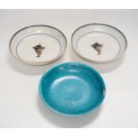 A Chinese turquoise glazed saucer dish, Qianlong Mark and period and two Chinese export famille rose