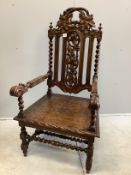 A late Victorian oak vineous carved elbow chair, width 66cm, depth 56cm, height 130cm