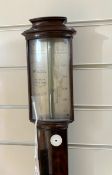 A 19th century mahogany stick barometer and thermometer by Watkins & Hill Charing Cross, London,