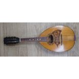 A 1920's Swiss flat backed mandolin, length of body 31cm