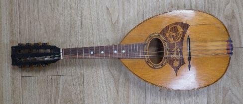 A 1920's Swiss flat backed mandolin, length of body 31cm