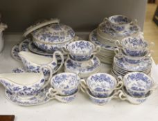 A Wedgwood bone china blue and white dinner service including oval platters, sauce boats and a