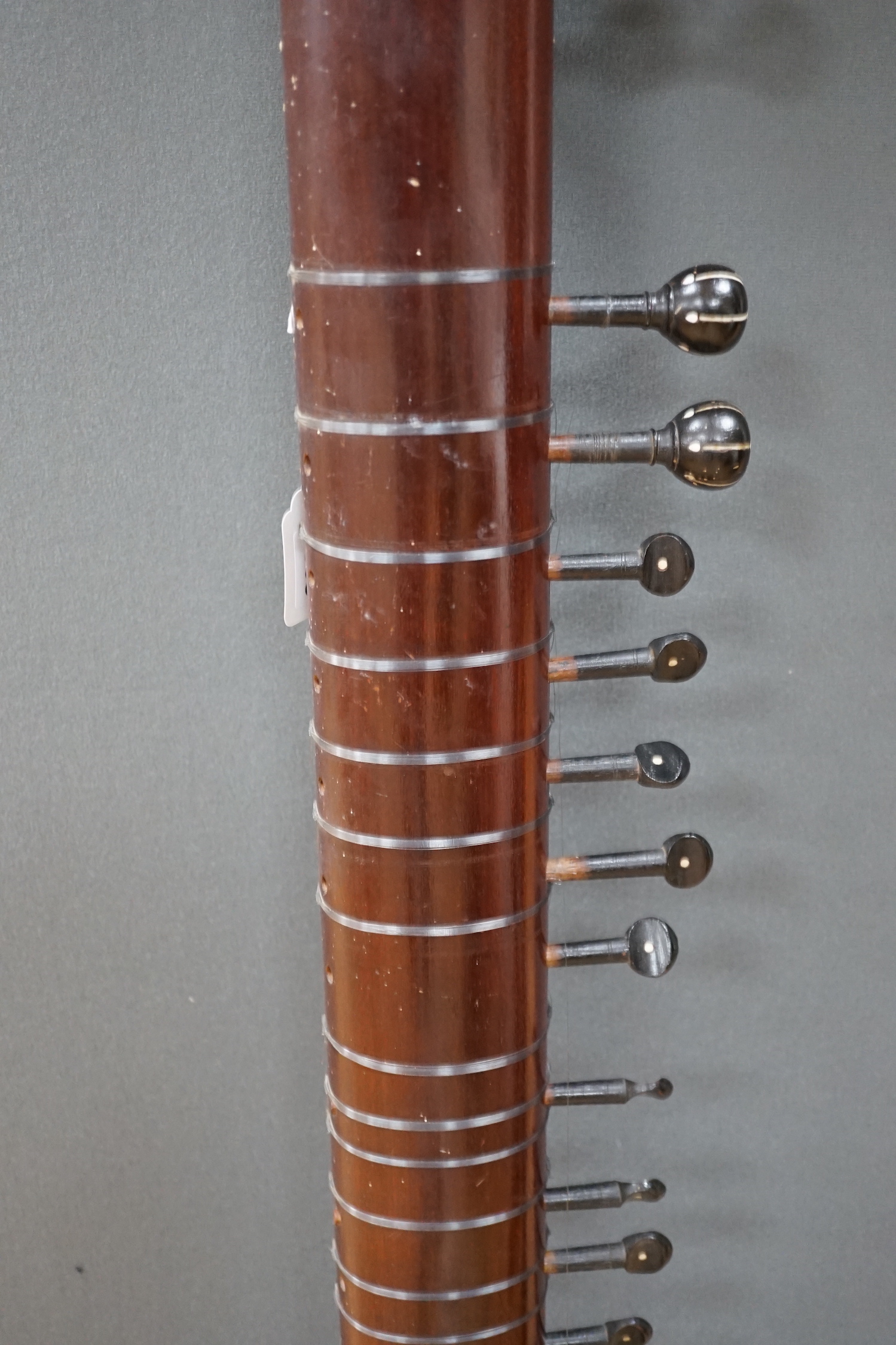 An Indian sitar, with ivory bridge and decoration, inlaid with ‘Harbhajan Grewal’ overall length - Image 7 of 7