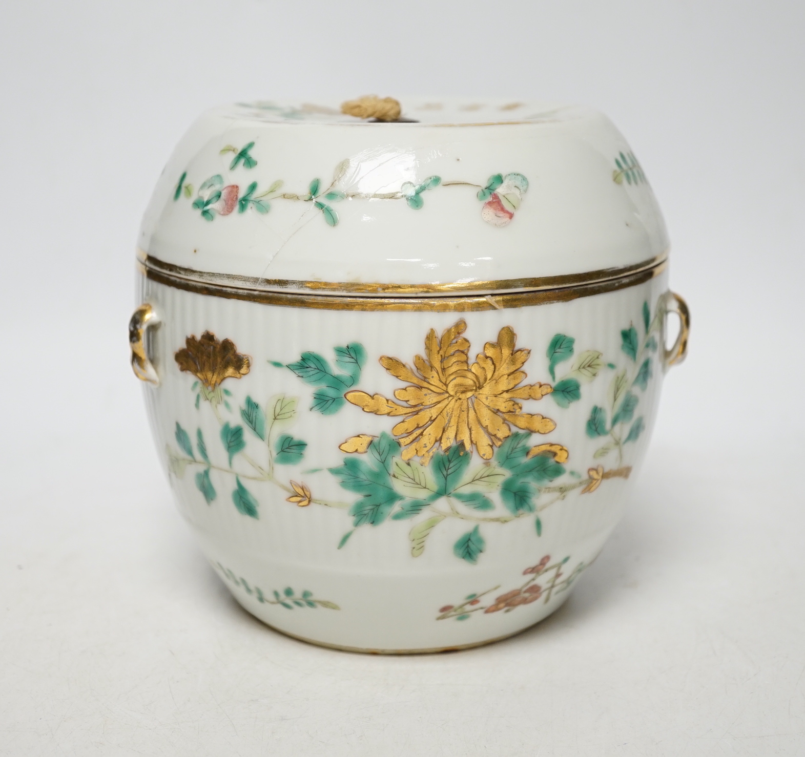 A Chinese enamelled porcelain barrel shaped jar and covered, 19th century, 16cm high