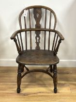 A 19th century ash and elm child's Windsor elbow chair, width 46cm, depth 32cm, height 76cm