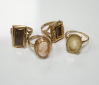 Two 19th century yellow metal mourning brooches, now with shanks converted to dress rings and two
