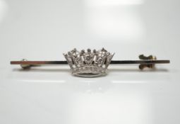 A 1940's white metal (stamped 14ct and platinum) and diamond cluster set coronet bar brooch, 50mm,