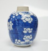 A Chinese Kangxi blue and white ‘prunus’ ovoid jar, 11cm