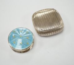 A George V silver and enamelled circular pill box and cover, Birmingham, 1910, 48mm and a German 900