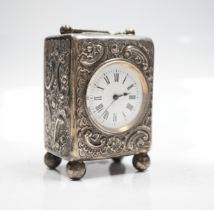 A late Victorian repousse silver cased carriage timepiece, John Newton Mappin, London, 1894, 79mm.