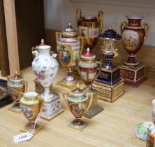 Ten Vienna type porcelain and brass pedestal vases, six with covers, largest 29cm high