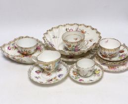 A group of Dresden porcelain floral tea wares, largest 24cm in diameter