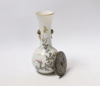 A Japanese bottle vase with lion mask and ring handles, together with a hardstone disc