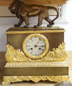 A French gilt mounted lion mantel clock with a silk suspension movement striking on a bell, 43cm
