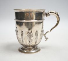 An Edwardian silver christening mug, with card cut decoration, Goldsmiths & Silversmiths Co Ltd,