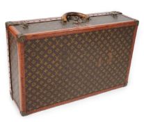 A vintage Louis Vuitton monogram canvas suitcase, no. 780445, 71cm x 44cm x 22cm