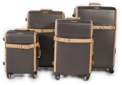 A graduated set of four Samsonite Black Label brown and tan hard suitcases, 83cm x 52cm x 34cm77cm x