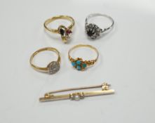 Three assorted 18ct and gem set rings, including 1920's diamond cluster, size K/L, one other early