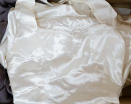 A white satin halter neck 1950's evening dress and a fine silk hand sewn day dress