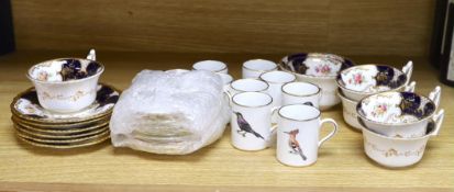 A Worcester bird decorated coffee set for ten and a Coalport tea set