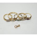 Four assorted early 20th century and later 18ct and gem set rings, including solitaire diamond and