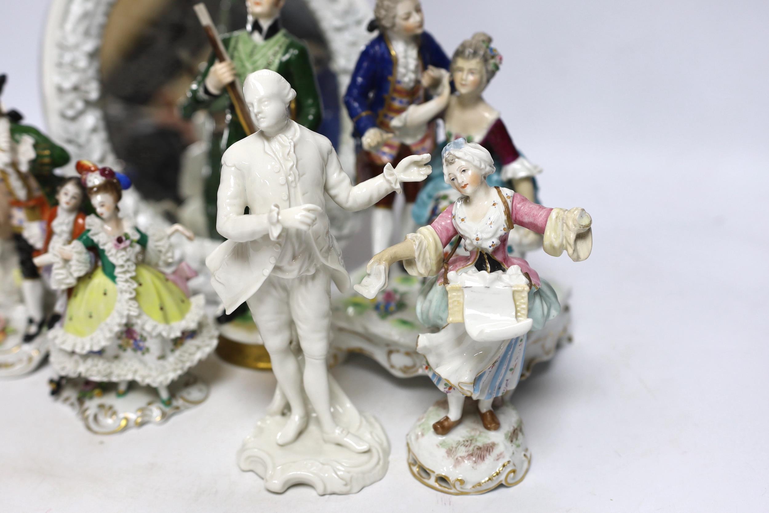 Seven Continental porcelain figures and an oval mirror with floral encrusted decoration, 27cm high - Image 4 of 6