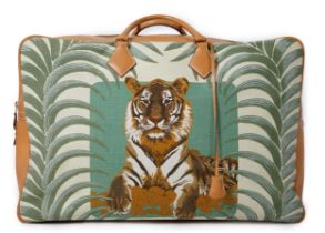 A Hermès Royal Tiger Plume 60 travel bag in leather and linen, with gold hardware, interior is