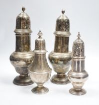 A pair of early to mid 20th century large silver sugar casters, marks rubbed, 23.8cm, weighted and