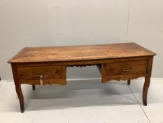 A late 18th century French Provincial fruitwood kneehole table, width 178cm, depth 70cm, height