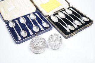 Two cased sets of six silver teaspoons, including Old English shell pattern by James Dixon & Sons,