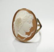 A 9ct and oval cameo shell set ring, carved with the head of Mercury, size O, gross weight 6.6
